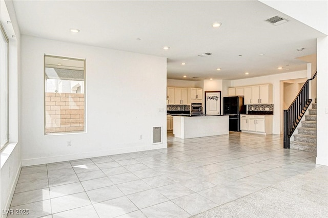 9993 Birch Knoll Ave, Las Vegas, NV 89166 - unfurnished living room with stairs, recessed lighting, light tile patterned flooring, and baseboards