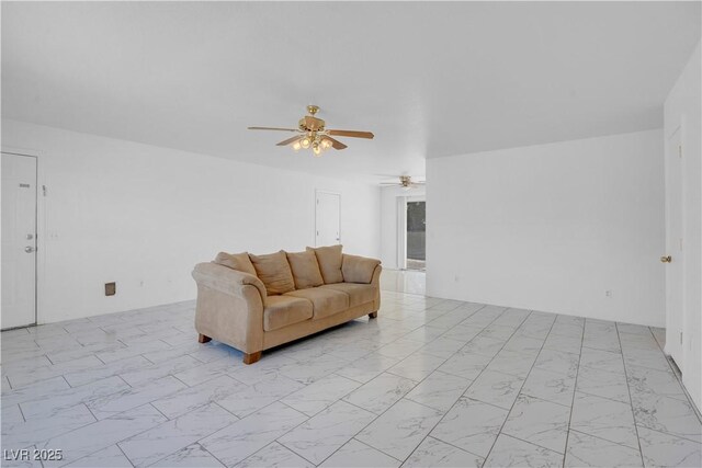 2831 Goldrush St, Pahrump, NV 89048 - living room with marble finish floor and ceiling fan