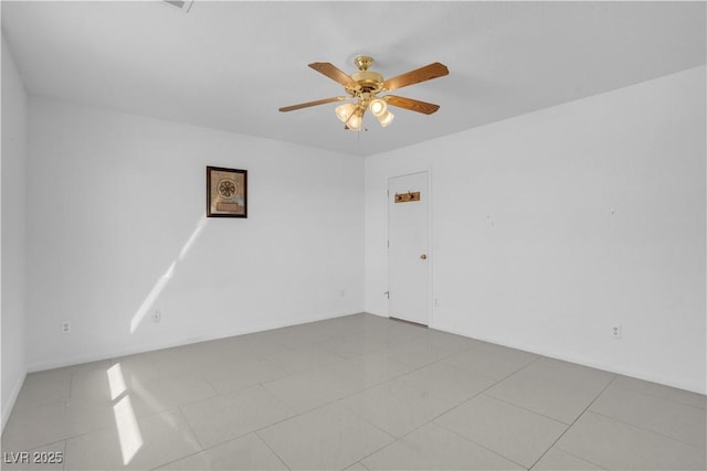 2831 Goldrush St, Pahrump, NV 89048 - spare room with ceiling fan and tile patterned flooring