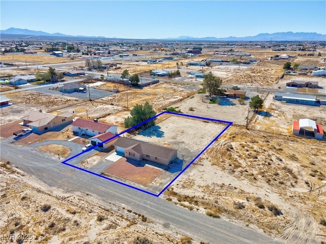 2831 Goldrush St, Pahrump, NV 89048 - birds eye view of property with view of desert and a mountain view