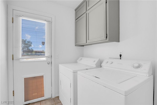 2831 Goldrush St, Pahrump, NV 89048 - clothes washing area featuring independent washer and dryer, cabinet space, and light tile patterned floors