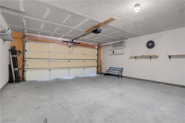 2831 Goldrush St, Pahrump, NV 89048 - garage featuring baseboards and a garage door opener