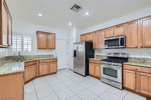 2409 Garganey Ave, North Las Vegas, NV 89084 - kitchen with appliances with stainless steel finishes, crown molding, light stone counters, a sink, and light tile patterned flooring