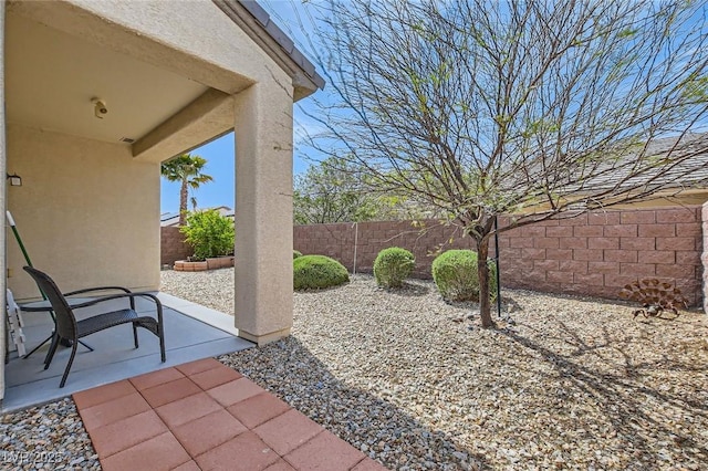 2409 Garganey Ave, North Las Vegas, NV 89084 - view of patio featuring a fenced backyard