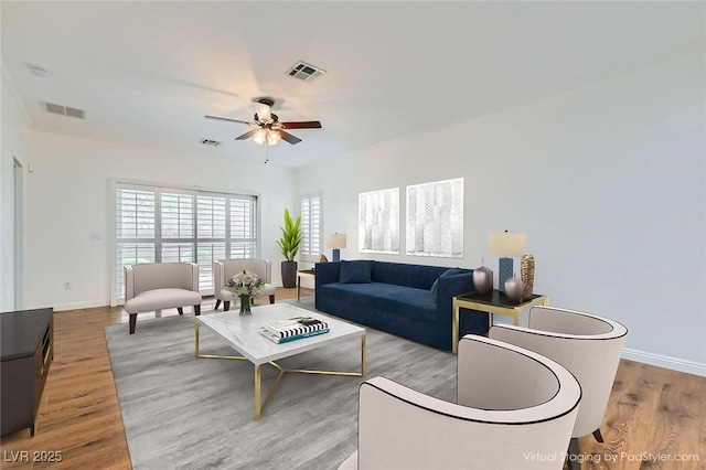 2409 Garganey Ave, North Las Vegas, NV 89084 - living area with a ceiling fan, wood finished floors, and baseboards