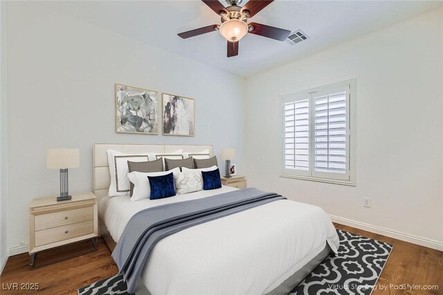 2409 Garganey Ave, North Las Vegas, NV 89084 - bedroom with baseboards, wood finished floors, and ceiling fan