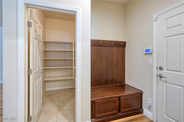 mudroom featuring light tile patterned floors