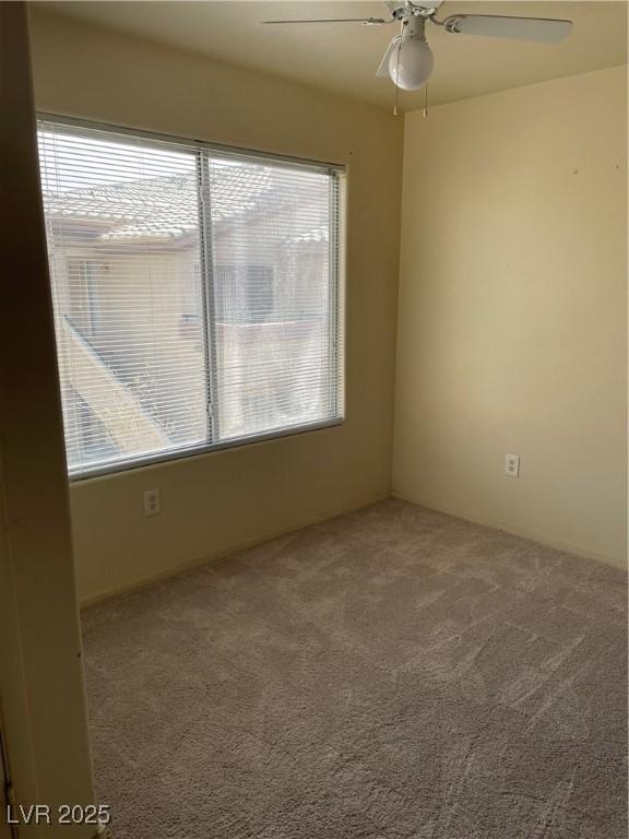 5710 E Tropicana Ave Unit 2033, Las Vegas, NV 89122 - carpeted spare room with a ceiling fan