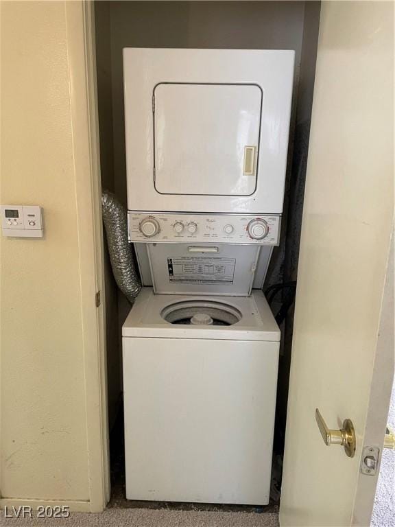 5710 E Tropicana Ave Unit 2033, Las Vegas, NV 89122 - laundry area featuring stacked washer / dryer