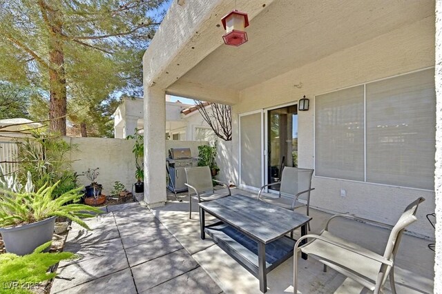 4932 Forest Oaks Dr, Las Vegas, NV 89149 - fenced backyard with a patio and grilling area