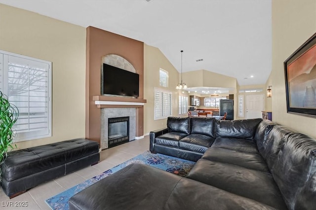 4932 Forest Oaks Dr, Las Vegas, NV 89149 - tiled living area featuring a large fireplace and lofted ceiling