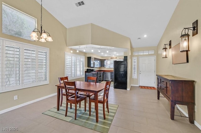 4932 Forest Oaks Dr, Las Vegas, NV 89149 - dining room featuring a chandelier, light tile patterned floors, and high vaulted ceiling