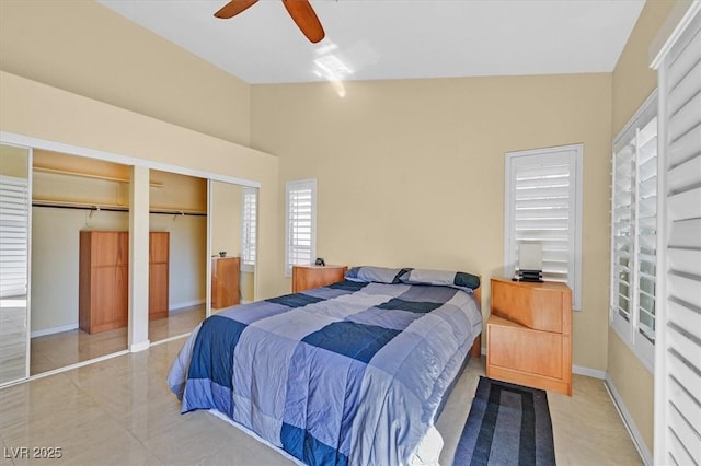 4932 Forest Oaks Dr, Las Vegas, NV 89149 - bedroom featuring multiple closets, a ceiling fan, and vaulted ceiling