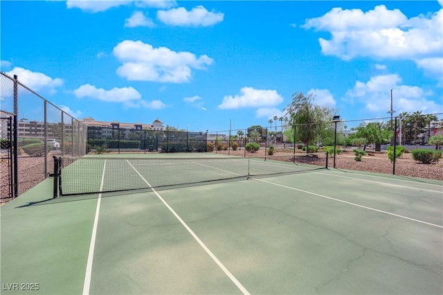 view of sport court with fence