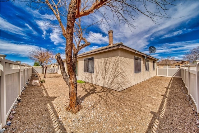 3891 Sedgwick, Pahrump, NV 89061 - exterior space featuring stucco siding and a fenced backyard