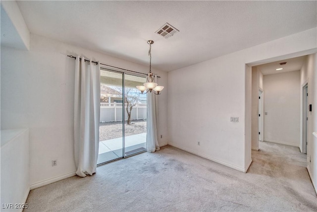 3891 Sedgwick, Pahrump, NV 89061 - interior space featuring baseboards, visible vents, carpet flooring, and an inviting chandelier