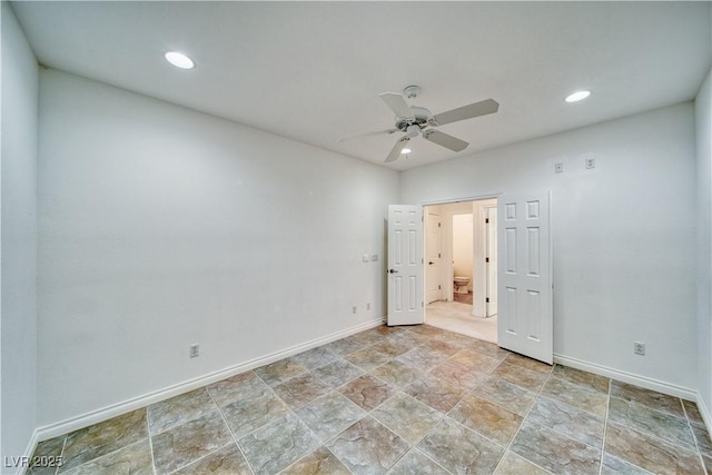 3891 Sedgwick, Pahrump, NV 89061 - unfurnished bedroom featuring connected bathroom, baseboards, ceiling fan, and recessed lighting