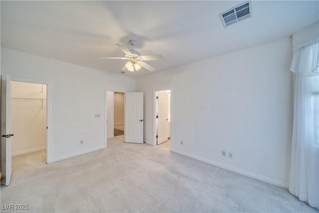 3891 Sedgwick, Pahrump, NV 89061 - unfurnished bedroom with baseboards, visible vents, a spacious closet, and carpet