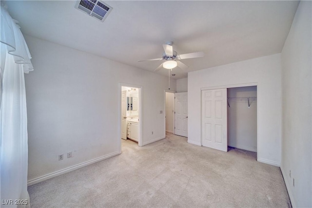 3891 Sedgwick, Pahrump, NV 89061 - unfurnished bedroom with baseboards, visible vents, a closet, and light carpet