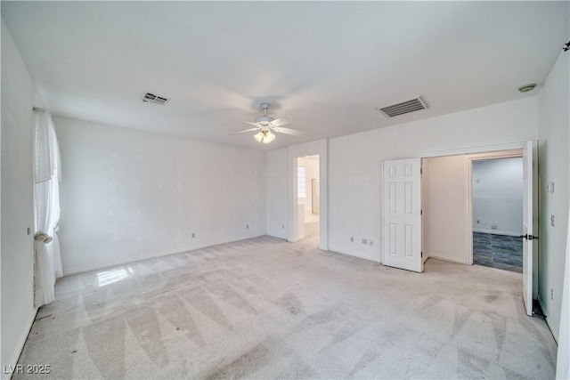 3891 Sedgwick, Pahrump, NV 89061 - unfurnished bedroom featuring ensuite bathroom, light colored carpet, and visible vents
