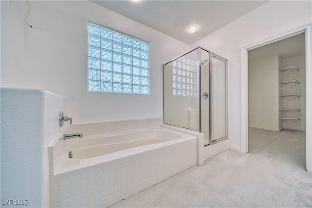 3891 Sedgwick, Pahrump, NV 89061 - full bathroom featuring a shower stall, a spacious closet, and a bath