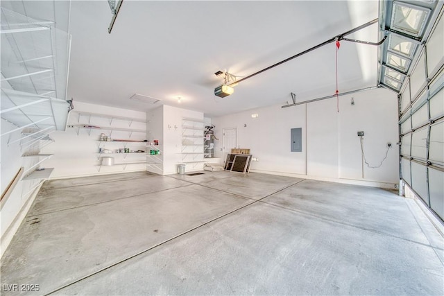 3891 Sedgwick, Pahrump, NV 89061 - garage featuring electric panel and a garage door opener