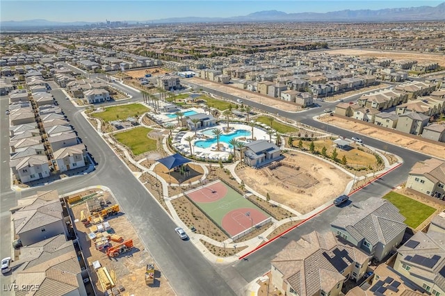 6952 Crimson Shadow St, North Las Vegas, NV 89086 - aerial view of residential area featuring a pool area and mountains