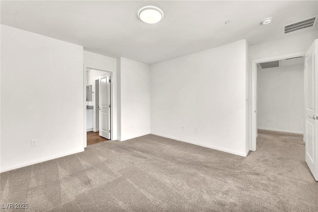 6952 Crimson Shadow St, North Las Vegas, NV 89086 - unfurnished room with carpet floors, baseboards, and a smoke detector