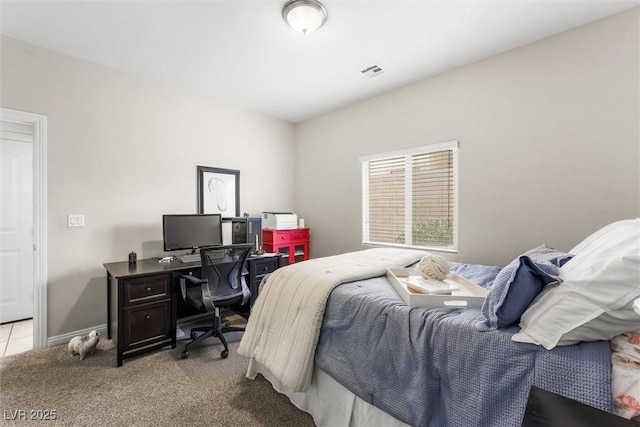 bedroom with carpet, baseboards, and visible vents