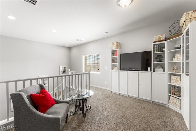 living area featuring an upstairs landing, visible vents, carpet, baseboards, and recessed lighting