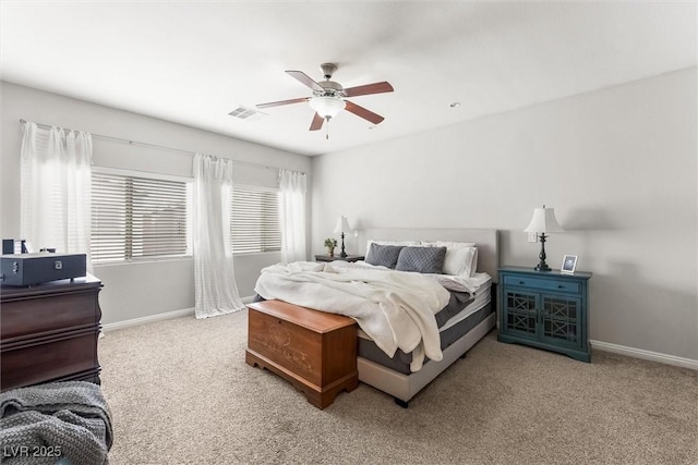 bedroom with a ceiling fan, carpet, baseboards, and visible vents