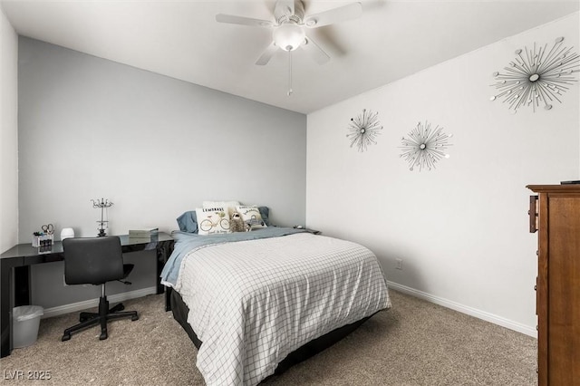 carpeted bedroom featuring baseboards and ceiling fan
