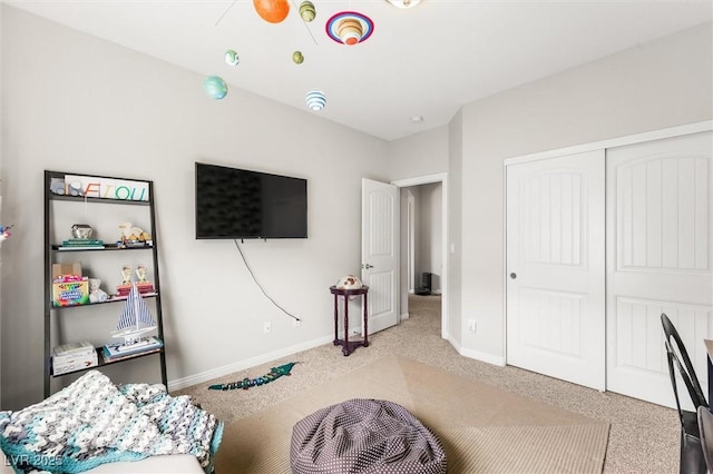 interior space featuring baseboards and carpet floors