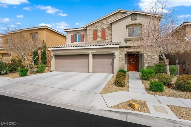 mediterranean / spanish house featuring stucco siding, stone siding, a tiled roof, driveway, and a garage