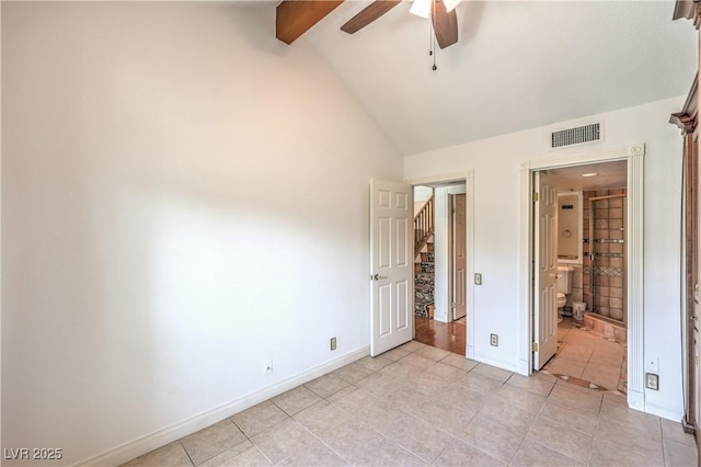 unfurnished bedroom featuring light tile patterned flooring, high vaulted ceiling, visible vents, beamed ceiling, and baseboards