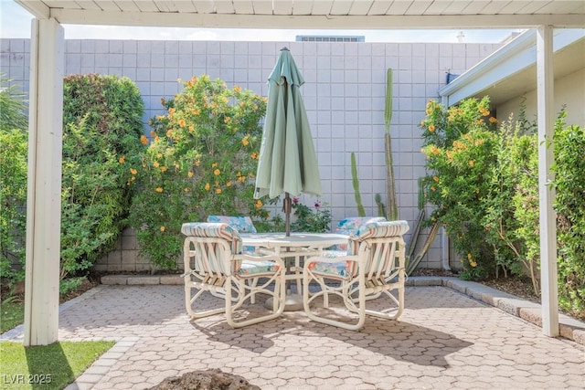 view of patio / terrace featuring visible vents and outdoor dining area