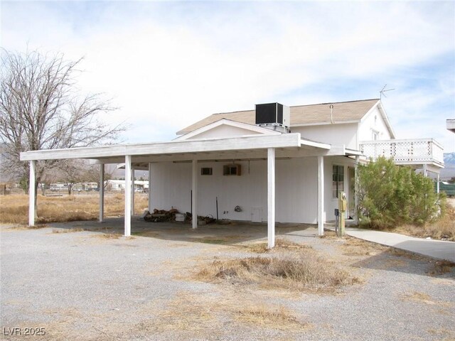 861 Mcmurray Dr, Pahrump, NV 89060 - exterior space featuring driveway, a carport, and central air condition unit