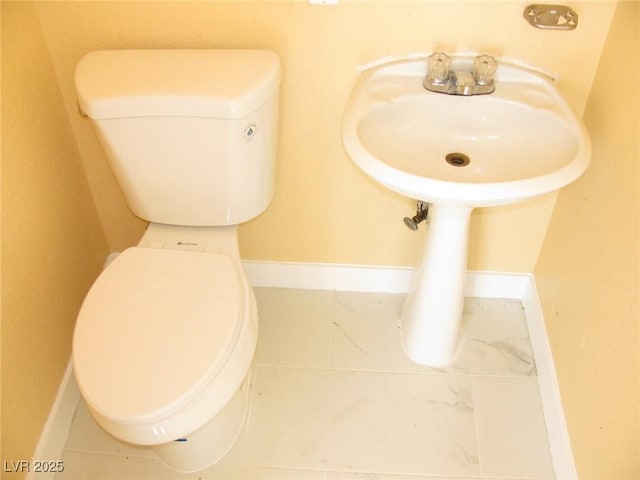 861 Mcmurray Dr, Pahrump, NV 89060 - details featuring baseboards and toilet