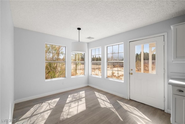 861 Mcmurray Dr, Pahrump, NV 89060 - unfurnished sunroom with a wealth of natural light and visible vents