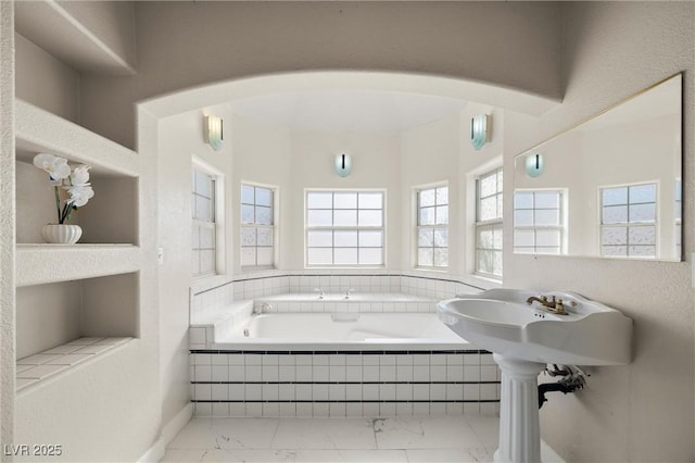 861 Mcmurray Dr, Pahrump, NV 89060 - bathroom featuring marble finish floor and a garden tub