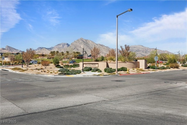 11834 Albissola Ave, Las Vegas, NV 89138 - view of street with sidewalks, a mountain view, and curbs