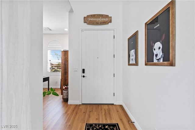 11834 Albissola Ave, Las Vegas, NV 89138 - foyer entrance with light wood-style flooring, baseboards, and visible vents