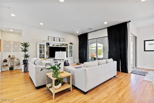 11834 Albissola Ave, Las Vegas, NV 89138 - living area with baseboards, light wood-style flooring, and recessed lighting