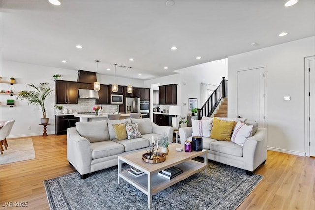 11834 Albissola Ave, Las Vegas, NV 89138 - living area featuring stairs, light wood-style floors, and recessed lighting