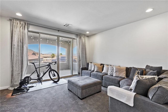 11834 Albissola Ave, Las Vegas, NV 89138 - living room featuring baseboards, visible vents, dark carpet, and recessed lighting