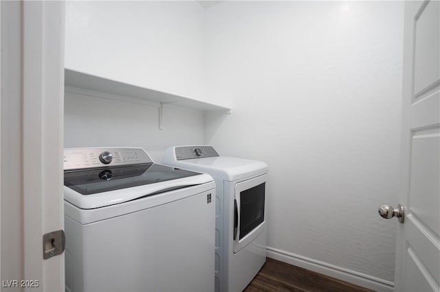 600 N Carriage Hill Dr Unit 2174, Las Vegas, NV 89138 - laundry room with washing machine and clothes dryer, dark wood-style flooring, and baseboards