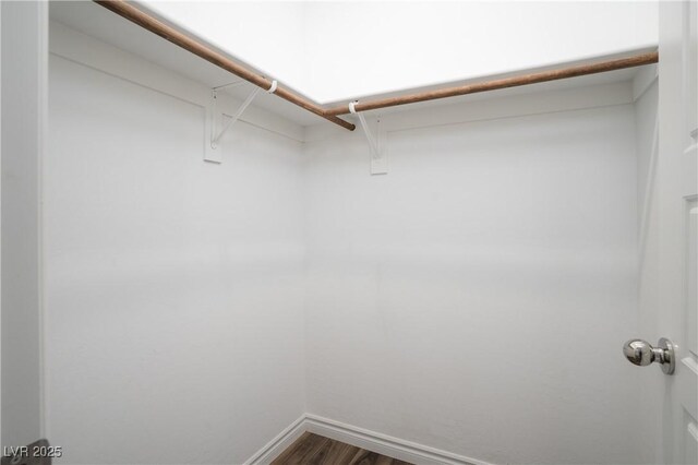 600 N Carriage Hill Dr Unit 2174, Las Vegas, NV 89138 - spacious closet with dark wood finished floors and attic access
