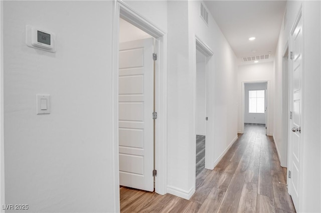 600 N Carriage Hill Dr Unit 2174, Las Vegas, NV 89138 - hall with light wood-style flooring, baseboards, and recessed lighting