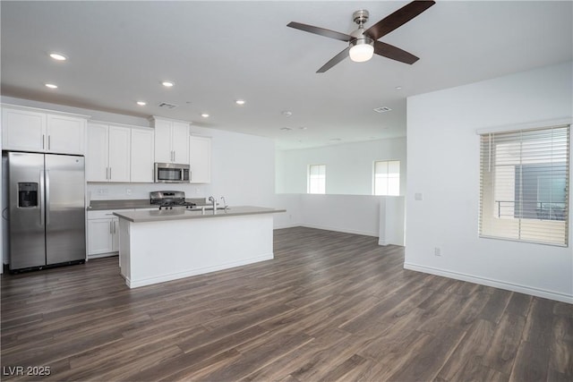 600 N Carriage Hill Dr Unit 2174, Las Vegas, NV 89138 - kitchen with stainless steel appliances, open floor plan, dark wood finished floors, recessed lighting, and a ceiling fan