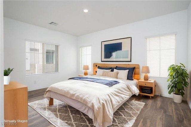 600 N Carriage Hill Dr Unit 2174, Las Vegas, NV 89138 - bedroom with multiple windows, wood finished floors, baseboards, and recessed lighting